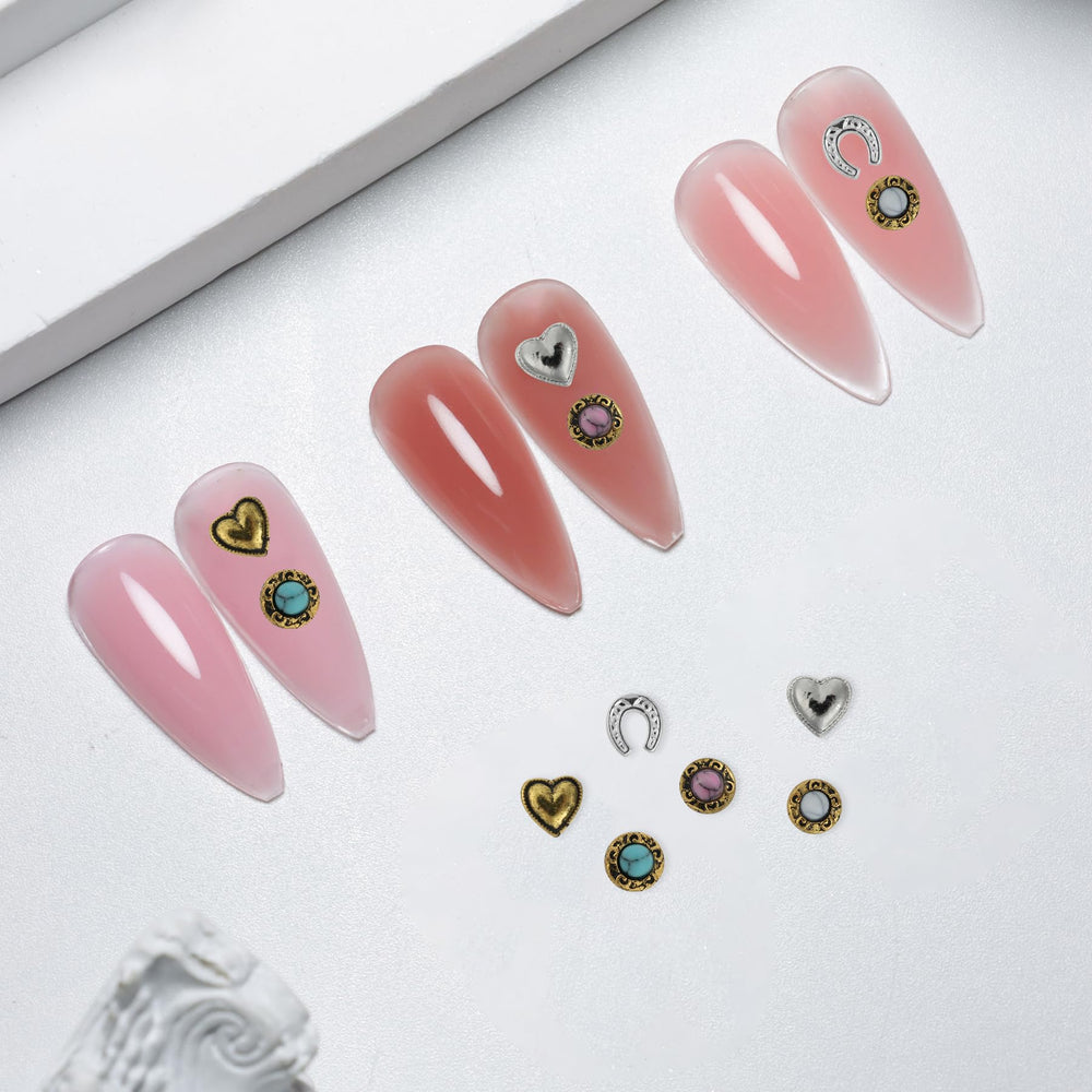 Ohmique flat-lay of all charms showing design variety for creative manicure options