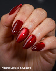 OIFEN press-on nails in hand to show scale and realistic fit for everyday use