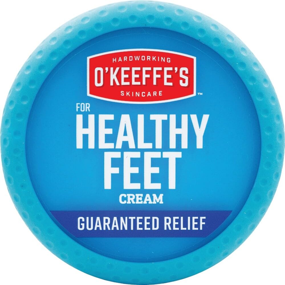 O'Keeffe's jar beside a foot to show product size and practical portability