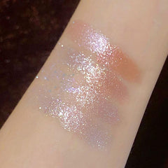 Okerker palette in use on eyelid demonstrating sparkle impact and long-wear benefit