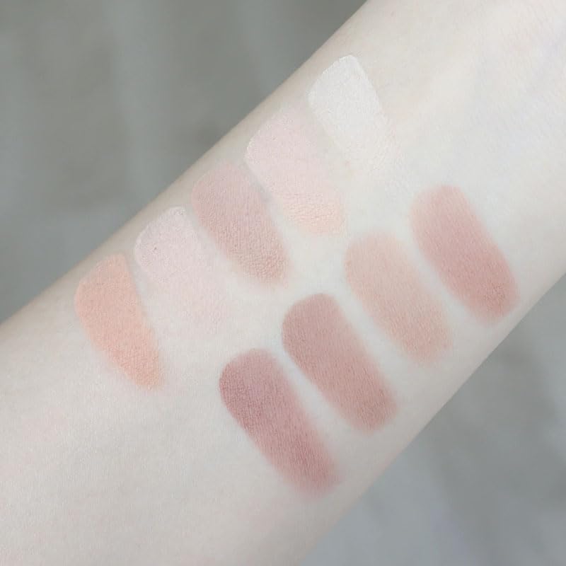 Okerker swatches on arm displaying true-to-tone pigmentation and layering benefits