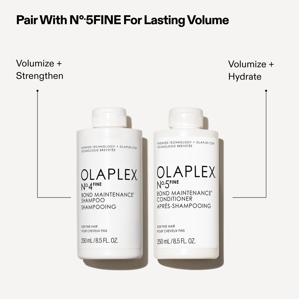 Applying Olaplex Nº.4 FINE to wet hair showing even distribution benefit