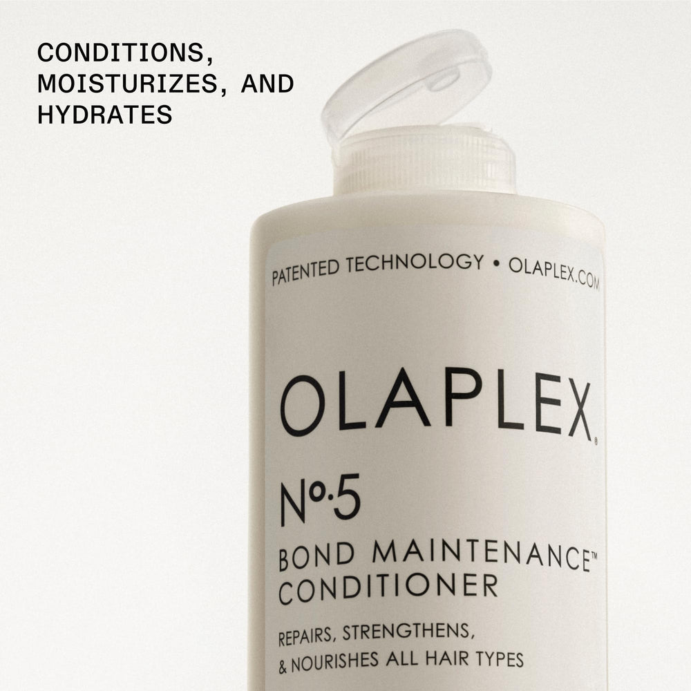 Applying Olaplex No.5 to mid-lengths and ends demonstrating detangling and strength benefits