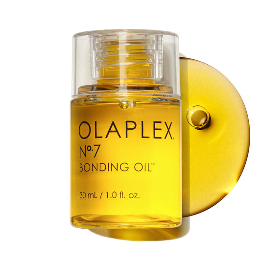 Olaplex No.7 front bottle showing compact travel-friendly size and brand