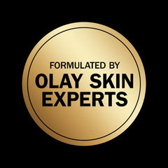Hand holding Olay bar under water showing easy use and refreshing feel