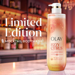Flat-lay of key ingredients with Olay bottle highlighting serum complex