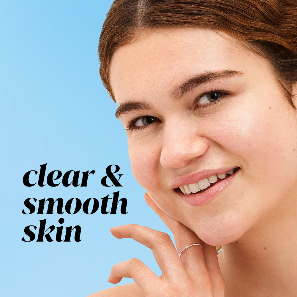 Olay toner pouring on hand to show lightweight texture and absorbency