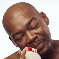 30 fl oz Old Spice bottle next to a travel bottle showing size and long‑lasting value benefit