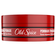 Old Spice on bathroom shelf next to mirror for everyday grooming routine