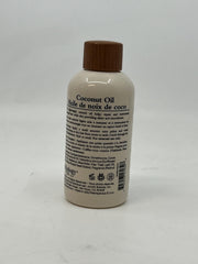 Oliology 4oz bottle beside a ruler to show true size and portability