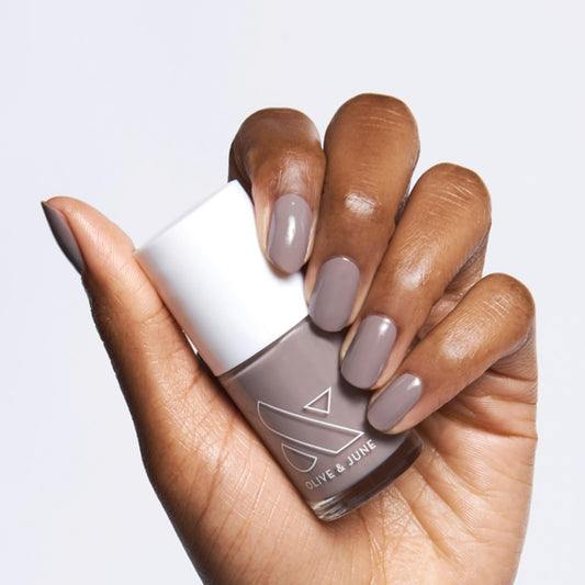 Olive & June front packaging showing AW Warm Grey and benefit of salon finish