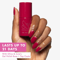 Olive & June brush and cap demonstrating smooth application and precise control