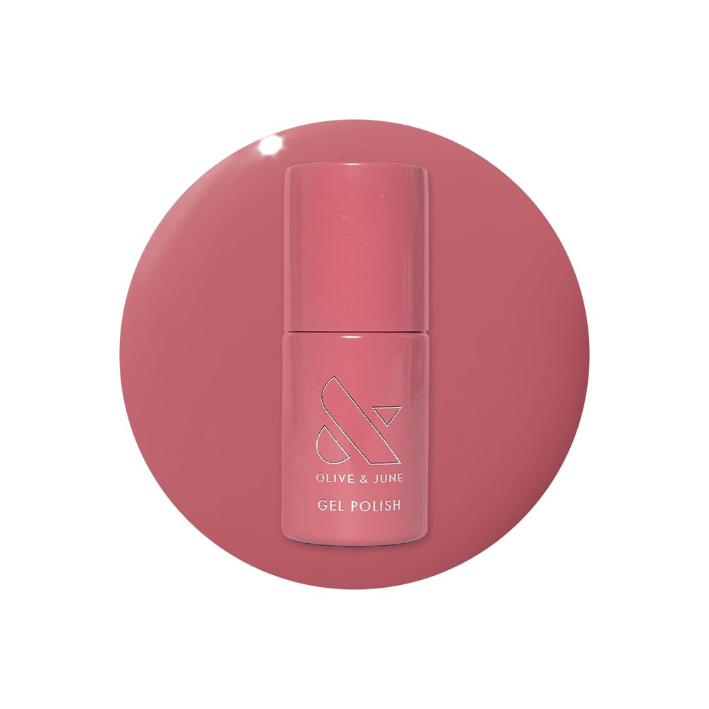 Olive & June bottle front packaging showing boysenberry color and brand benefit