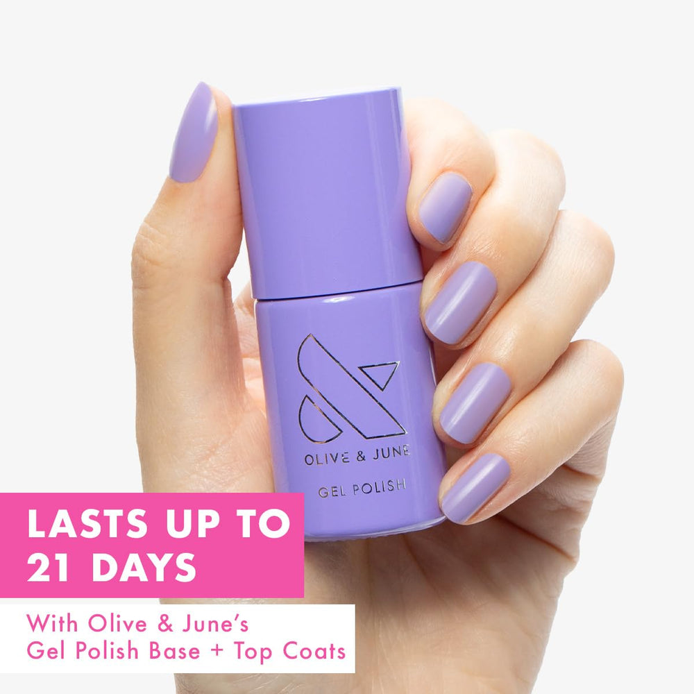 Olive & June brush cap close-up displaying smooth application for precise strokes