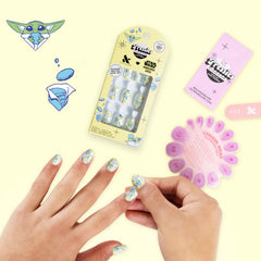 Olive & June nail tip being filed showing neat salon finish