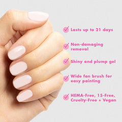 Olive & June cured manicure on hands lifestyle photo showcasing salon shine