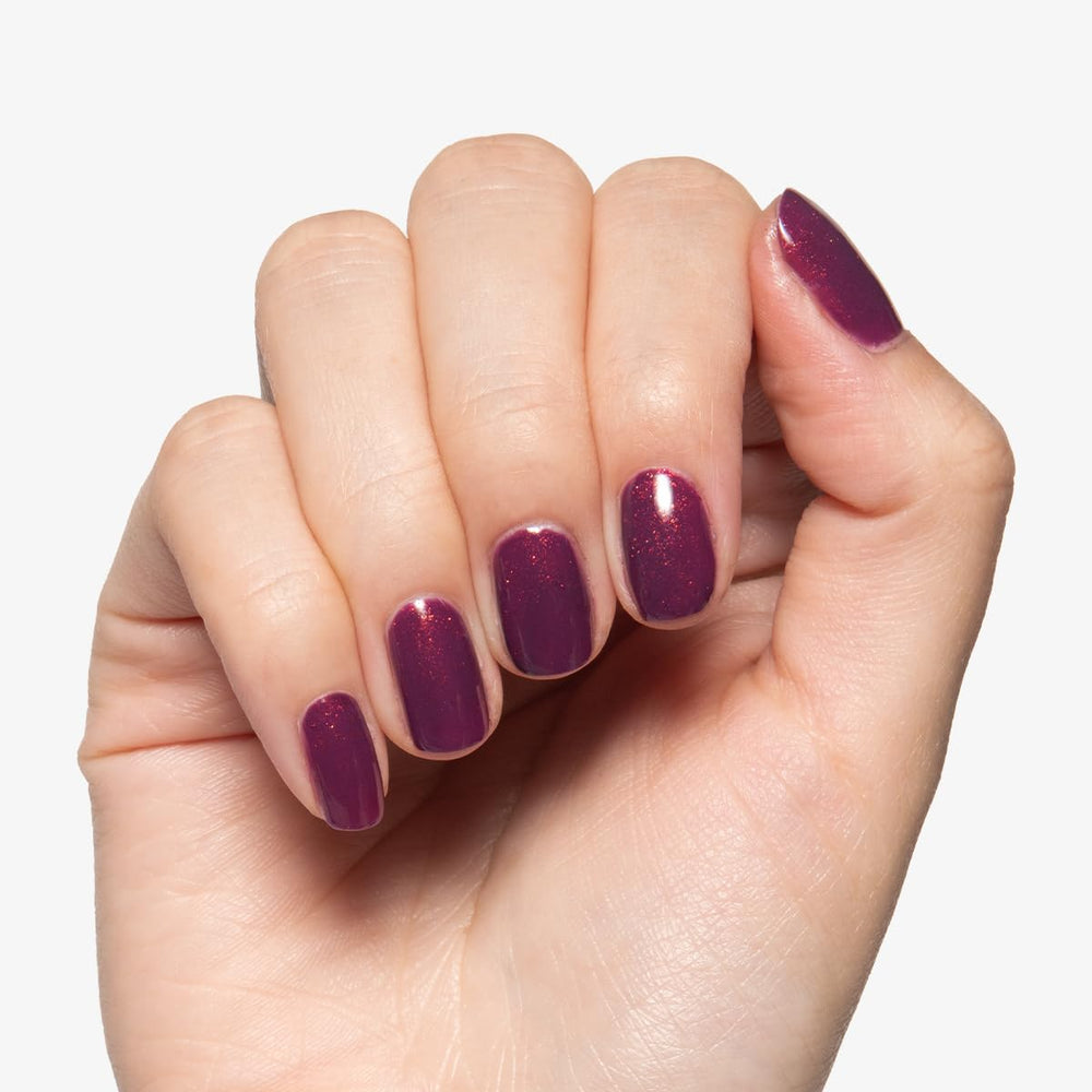 Olive & June cured manicure top-down view showcasing chip-resistant shine benefit