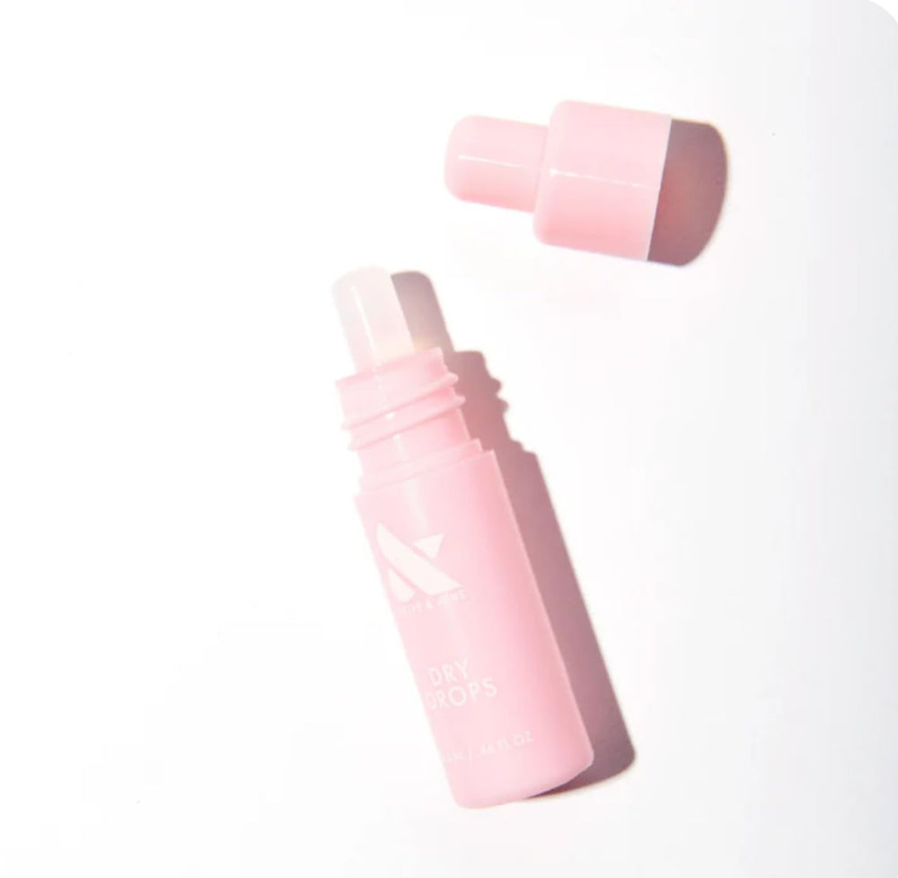 Olive & June Dry Drops applied to nail showing quick drying benefit