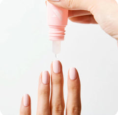 Olive & June nozzle close-up highlighting easy-squeeze precise application