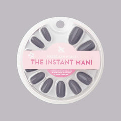 Olive & June front packaging showing full Instant Mani kit and tools, clear convenience benefit