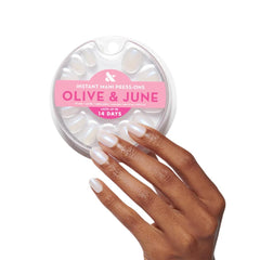 Olive & June front packaging showing Pink Goldfish nails and included tools for salon-quality results