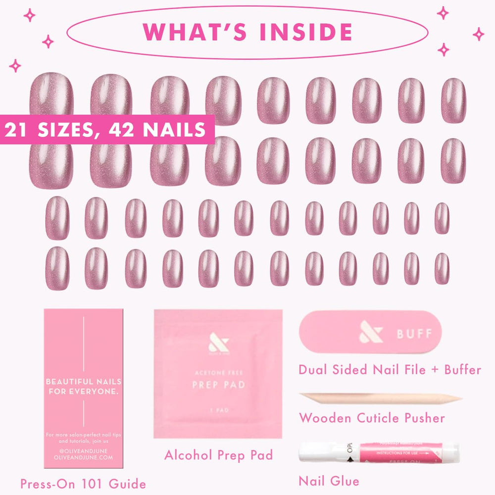 Olive & June styled hands wearing short round nails for everyday wear