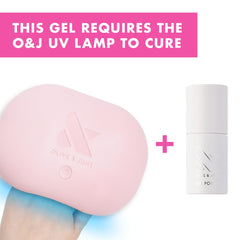 Olive & June LED lamp curing nails demonstrating quick, salon-quality cure benefit