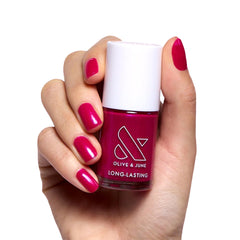 Olive & June bottle front view showing shimmering magenta finish and shine