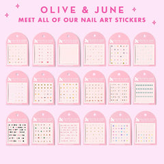 Olive & June lifestyle shot with finished nails showcasing fandom-ready manicure