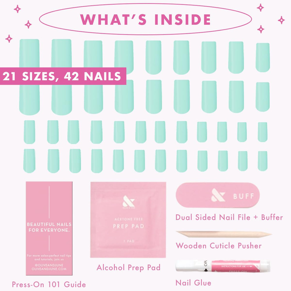 Olive & June nails beside a ruler illustrating size and scale options