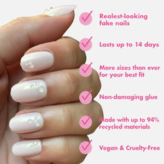 Olive & June nails applied on hands showing natural-looking short round benefit