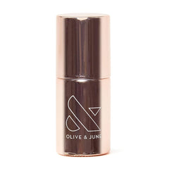 Olive & June primer front packaging showing sleek bottle and label benefit
