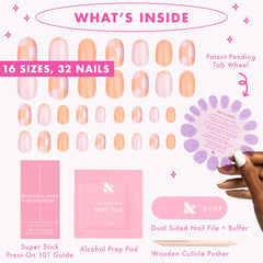 Olive & June scale comparison on a hand model showing short round shape