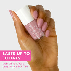 Olive & June wide brush stroke demonstrating even coverage benefit