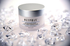 OLYPHAN applied to model's cheek demonstrating gentle exfoliation and hydrated glow