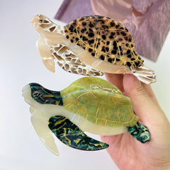 OMG Decor green turtle pattern detail highlighting decorative nature-inspired design