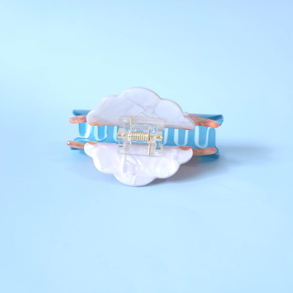 OMG Decor clip styled with beach outfit demonstrating coastal accessory for summer looks