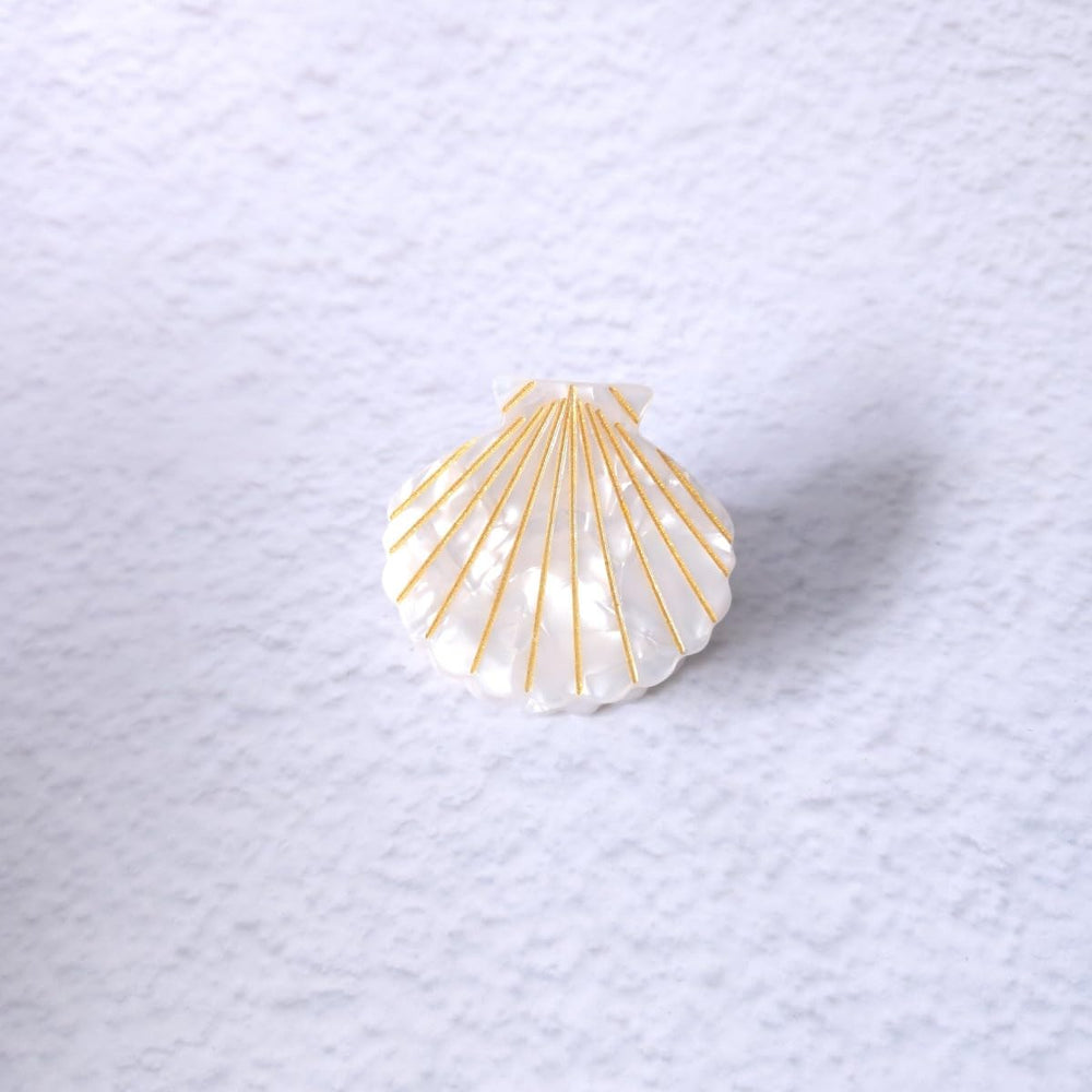OMG Decor white shell claw clip texture closeup showing acetate fiber sheen