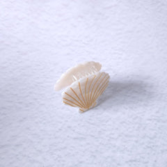 OMG Decor white shell claw clip beside ruler showing compact travel-friendly size
