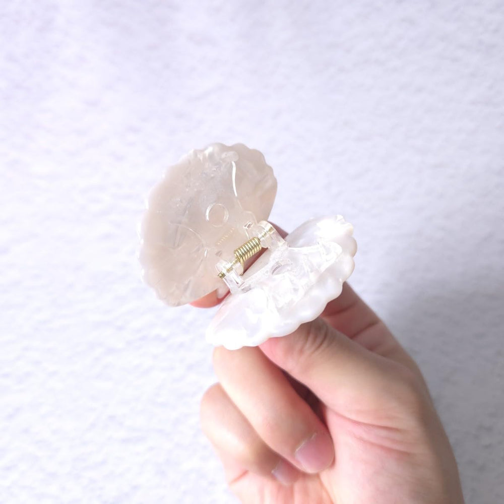 OMG Decor white shell claw clip closeup of teeth showing reliable grip