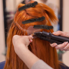 Ondder clip securing hair while blow-drying for hands-free styling benefit