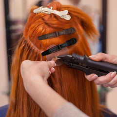 Ondder clip holding hair mid-section, secure styling control