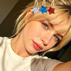 Ondder clips styled in a girl's hair showing patriotic accents and easy wear