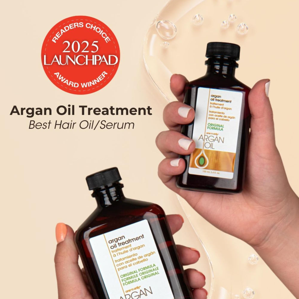 Close-up of golden argan oil texture from One 'n Only illustrating smooth absorption benefit