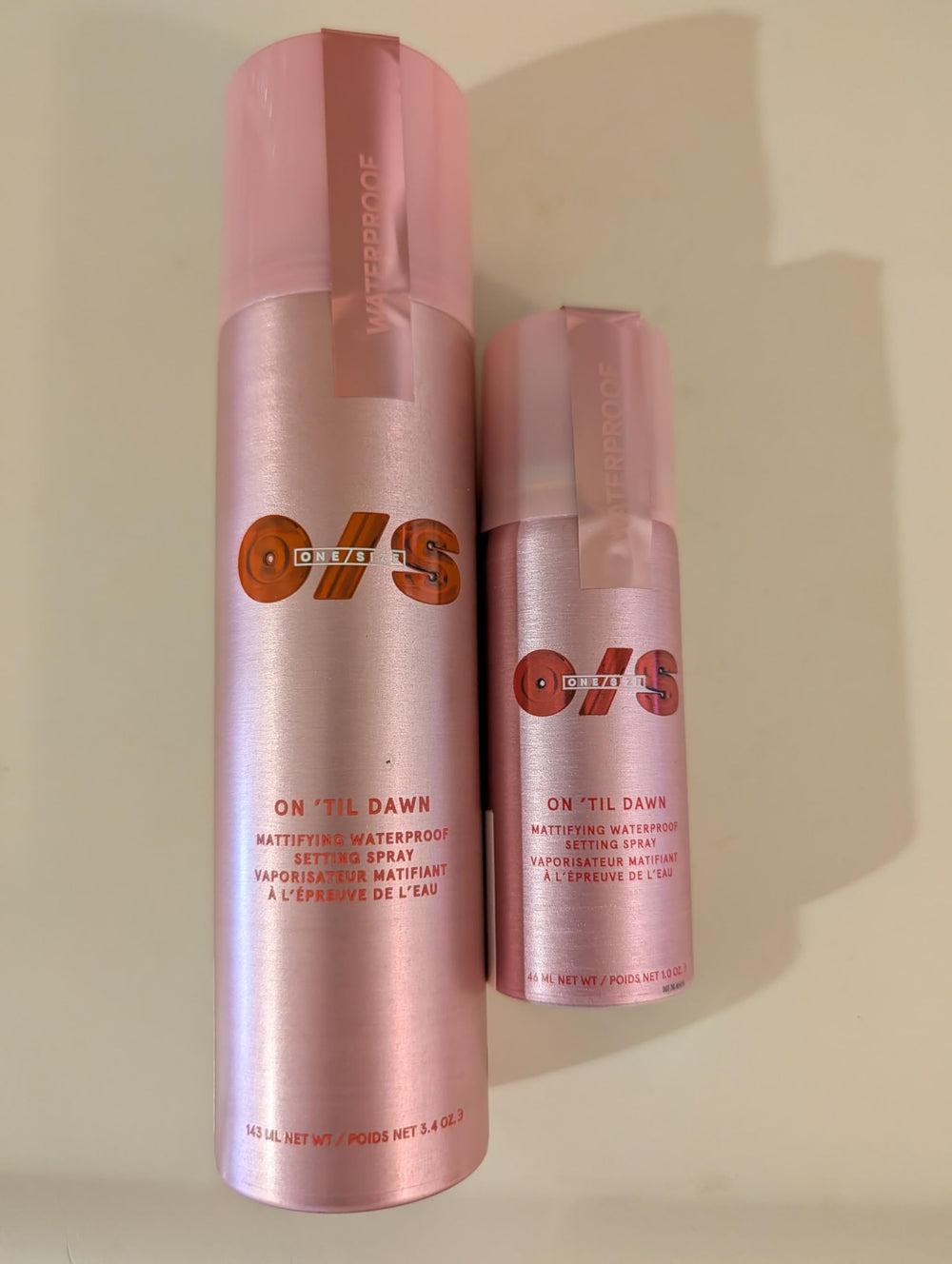 ONE/SIZE spraying onto makeup face showing longwear benefit in use