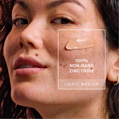 OneSkin creamy texture close-up demonstrating easy blending into skin