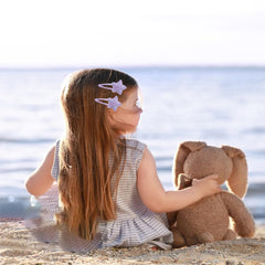 Ooosonlu clips styled in child's hair showing comfortable wear