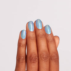 OPI polish on nails in a manicure showing glossy blue shimmer and chip resistance