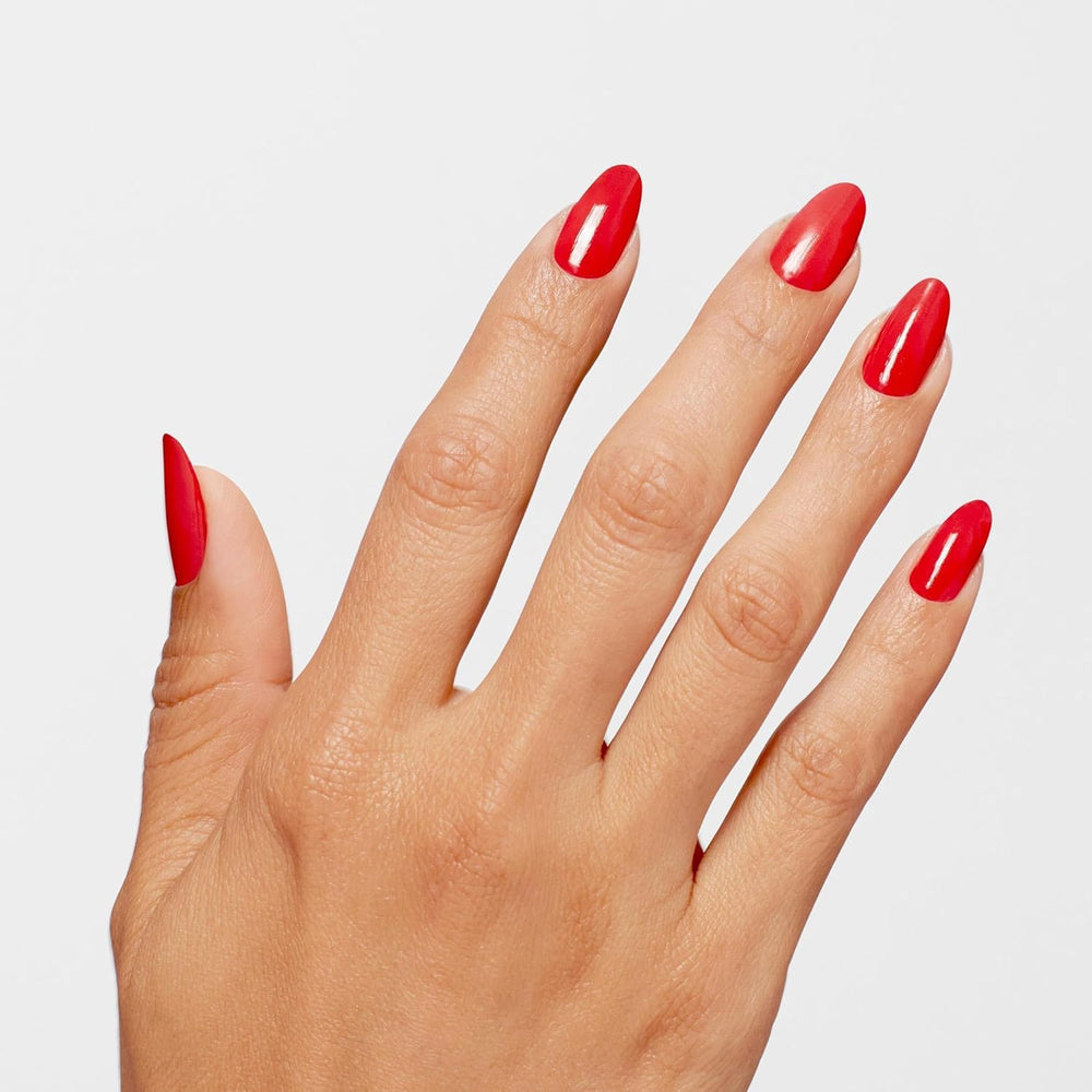 OPI painted nails in Cajun Shrimp illustrating opaque color and salon finish
