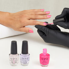 OPI Dopa-mani next to coin for scale illustrating bottle size and portability